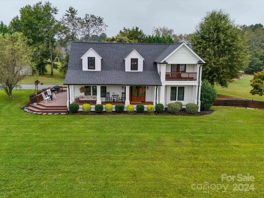 Motivated Sellers! Stunning 3 bedroom 5 full bathroom house with water views of Lake Tillery! Two primary bedrooms! Two lots with an elevated and spacious front yard. Excellent man cave and additional flex space/storage in basement.  Large deck, covered front porch and balcony all overlooking Lake Tillery! Listing includes both lots 66 & 67. Front half of roof replaced in 2020. Water heater is only approximately 2-3 years old. New windows, doors, and exterior paint 2022. New front porch decking and gutters 2023.