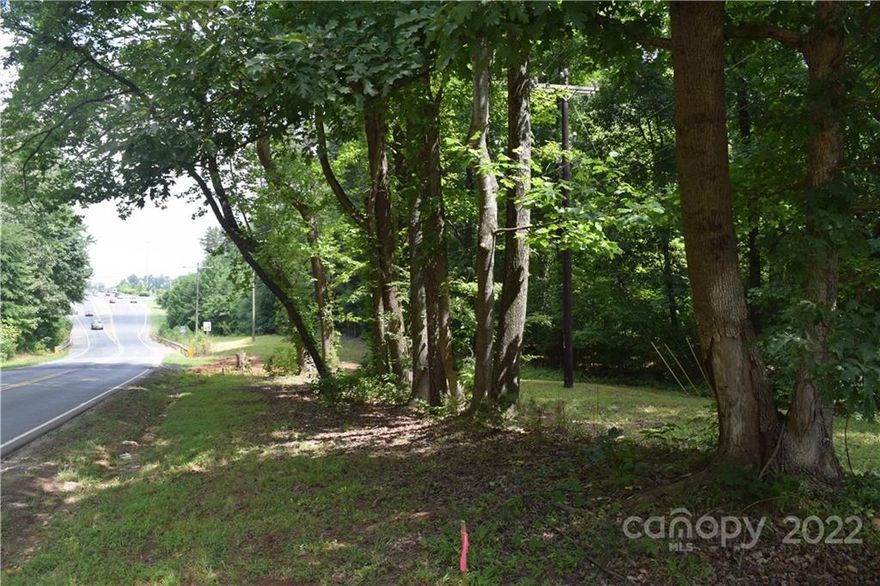 Great location off of I-485    Convenient to I 77 and Huntersville      Ideal location for  Signature Office  Building Hotel  site    Seller will sell subject to rezoning. 2040 Plan calls for high intensity housing/townhomes.
