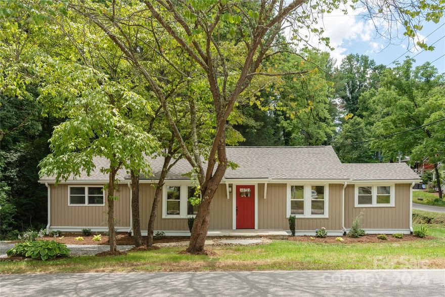 Completely renovated cottage in the sought after Lake Tomahawk area with an easy walk to all the shops, restaurants and fun that downtown Black Mountain has to offer! Enjoy the corner lot with serene back yard and small stream. Everything you want is newly updated and modern with some original charm left. The new luxury vinyl floors are beautiful and will make everyday living a breeze. Beautiful kitchen with new soft close kitchen cabinets, granite counters, Samsung Smart Things appliances. New roof, siding, updated plumbing with new water heater, updated electrical and HVAC system. Two all new bathrooms and three good sized bedrooms will make this perfect for full time living, a personal vacation home or a vacation rental – the possibilities abound!