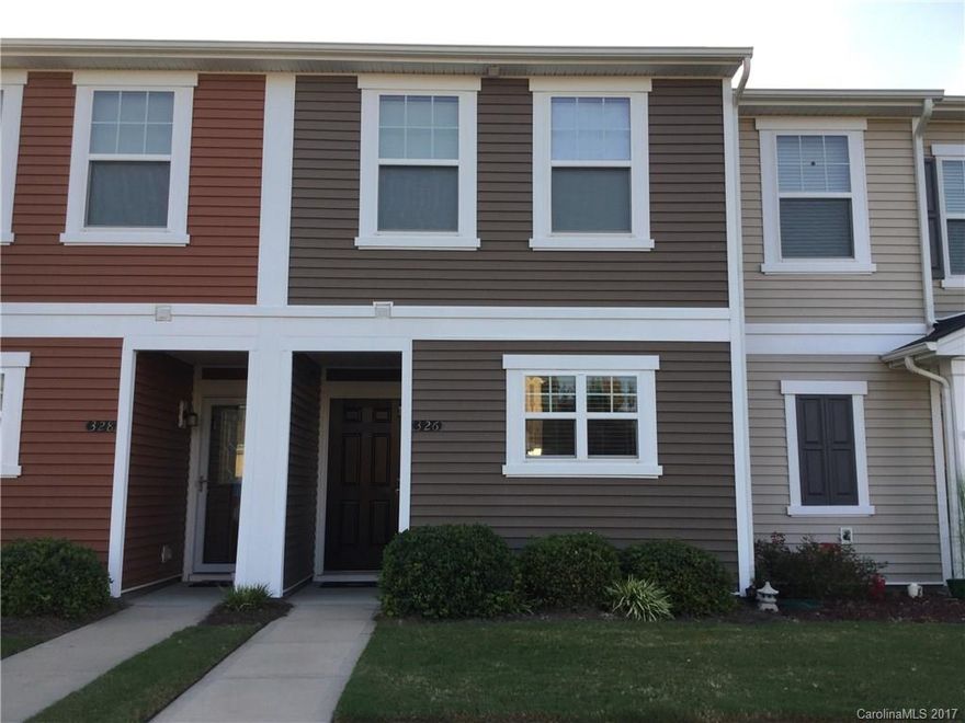 Waiting for you! is this perfect TOWNHOME. New flooring - waterproof laminate wood floors & carpet. Kitchen features tile floors, black appliances, walk in pantry, & upgraded cabinets. The open Dining/Living area overlooks the FENCED patio. New paint throughout. Double closets in Master. The hall bath has double sinks, a tub/shower combo & tile flooring. Laundry on the 2nd level with stacked W/D included. Extra storage off the patio. A nice quiet neighborhood with easy access to I-77 & 485.