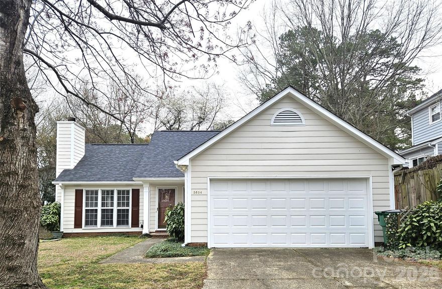 This remodeled move in ready home with fresh interior and exterior paint, features an open split floor plan designed for both comfort and functionality. At the heart of the home is the living room highlighted by a tile-surround gas fireplace, custom built-ins, eye-catching architectural accents, an abundance of windows that flood the space with natural light, and wide-plank “wood” Laminate flooring that flows seamlessly throughout, adding warmth and durability. That same flooring extends to the spacious primary bedroom while the secondary bedrooms offer new carpet.  The cozy kitchen offers brand-new soft-touch cabinetry, sleek quartz countertops and a complete stainless steel appliance package—perfect for both everyday cooking and entertaining. ALL appliances convey as well as the washer, dryer and garage frig.  Outside, enjoy the privacy of a fully fenced backyard complete with a metal-roof covered deck, ideal for year-round outdoor living. You just need to bring your personal touch to complete the landscaping. With a new roof and remote controlled Velux skylight, there's little maintenance left to do!  Come on and bring your furniture!