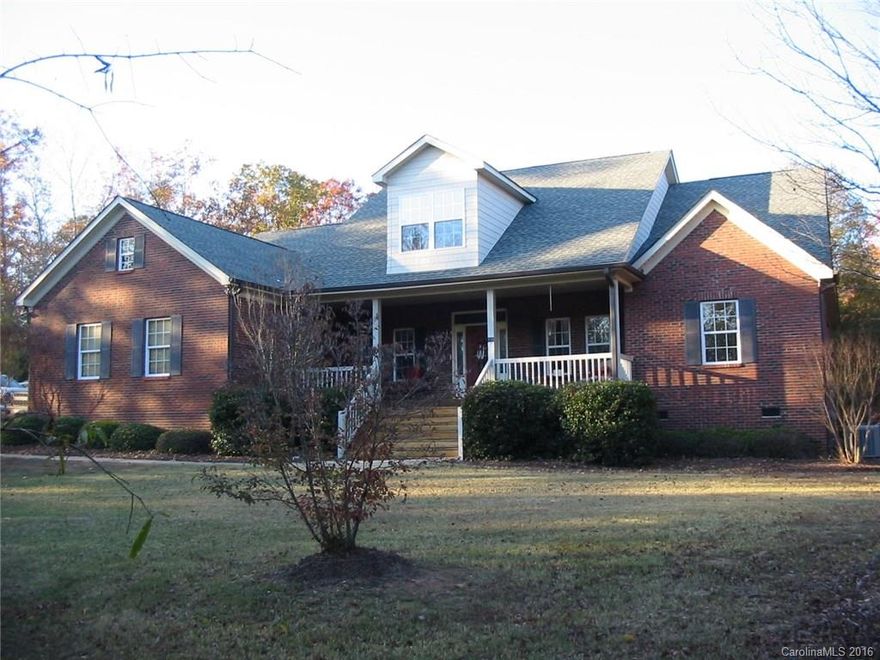 Very nice 4 bedroom 3 bath 1 1/2 story on large lot, hardwoods, tile, master on main, heavy moldings, designer kitchen with 42" cabinets, granite, fireplace, 2 car garage, new A/C downstairs with 10 year warranty, lots of privacy on the large 2.45 acre lot