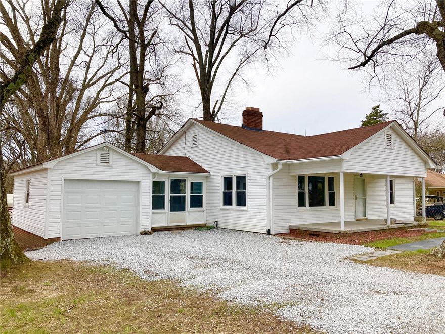 Downtown Landis! Move in Ready! Spacious 3-bedroom home is situated on a large lot, offering both space and convenience in the heart of Landis. Recently updated, this home features: Brand new gas heat unit for year-round comfort and cooling. Fresh new paint throughout, giving the home a clean, modern feel. A remodeled bathroom with stylish, contemporary finishes. Beautiful wood floors that add warmth and character. A large deck, perfect for outdoor entertaining and relaxation. Garage, 2 metal carports and a storage building, leaf gutter guards. This well-maintained home is move-in ready and offers comfortable living. Don’t miss out on the opportunity to make this house your new home!