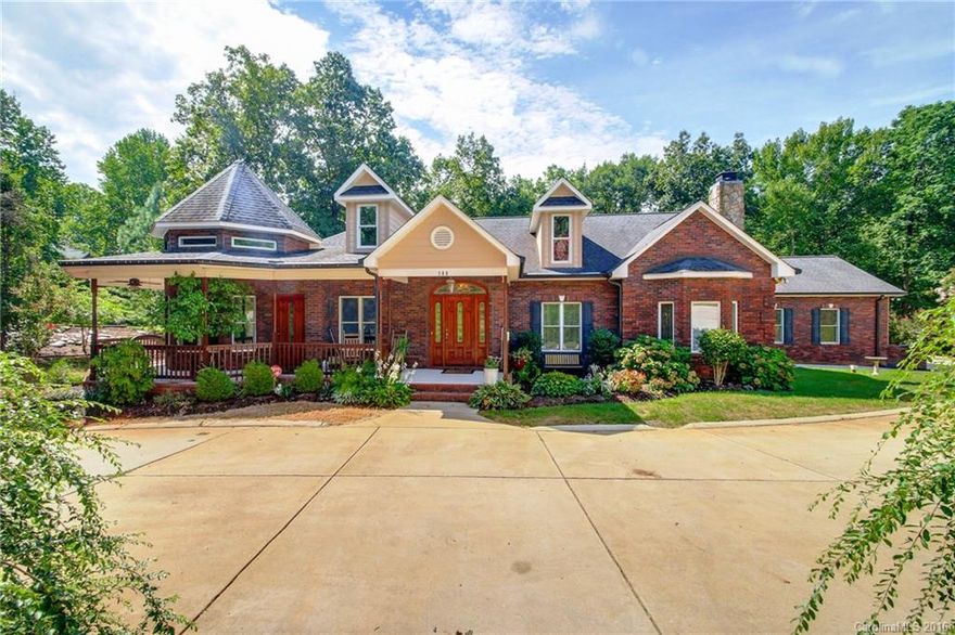 Stunning Custom Built home on 1.16 Acre Water View Wooded Lot. 4 Bed/3.5 Baths w/Hardwoods. Custom kitchen with Granite and Stainless appliances. Master Retreat with Fireplace, huge tile shower, & separate Jacuzzi Tub. Unique Circular Office. Finished Walk Out Basement features Full Wet Bar, Billiard Room, Bedroom w/ Full Bath, and plenty of additional storage. Fenced Backyard, Shed w/Electricity. Awesome location nearby to schools and Stumpy Creek Boat Launch, playground & athletic fields!