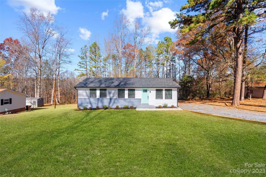 Welcome to 405 Dover Drive, a meticulously renovated haven in Bessemer City, NC. This home offers a perfect blend of modern luxury and timeless charm. The kitchen boasts new granite countertops, cabinets, sink, and a stylish backsplash. Throughout the house, enjoy new LVP flooring, fresh drywall, and elegant door trim. Two fully renovated bathrooms feature ceramic shower tiles. Stay comfortable year-round with brand new black windows and new attic insulation. The large driveway accommodates two or more vehicles.

Outside, relax on the new deck. The location is ideal, with parks, shopping, and dining options nearby. 405 Dover Drive invites you to experience modern living in the heart of Bessemer City—a sanctuary where thoughtful design meets contemporary comfort. Welcome home!