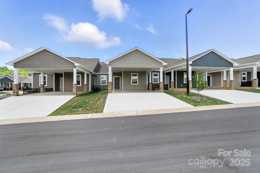 Enjoy low-maintenance living in this new townhome located in a desirable 55+ community in Hickory. Featuring 2 spacious bedrooms, 2 full baths, and an open living area, this home offers comfort and convenience. The kitchen flows seamlessly into the dining and living spaces, perfect for everyday living and entertaining. Relax on your private patio or take advantage of the community’s peaceful setting. Conveniently located near shopping, dining, and medical facilities, this home is ideal for those seeking comfort and convenience in a vibrant community.