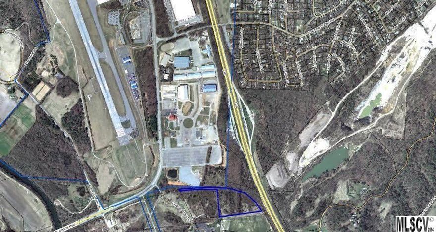Property is 1 of 2 Parcels available, 14 Acres total. Unique opportunity to develop property located next to Broadmoor Golf and Western Carolina Agricultural Center. Directly across from Asheville Airport.