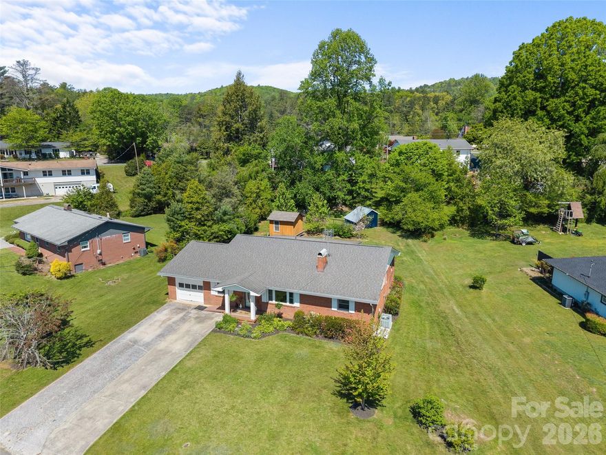 Enjoy a prime location near the Brevard Greenway (connecting to the Ecusta Trail), waterfalls, Community college, and 64. A classic brick ranch is always the best choice for growing value.  No stairs and no carpet in this home for easy living. The floors are durable for pets and easy to clean. The kitchen is huge, bright, and perfectly situated between the large screened in patio and dining room!  Chefs will enjoy the wall oven, plenty of countertop space, and new cooktop.  With four bedrooms and plenty of bathroom’s , space isn’t a problem. The new lighting throughout will brighten your day.  Outside there is a garden ready to grow your veggies. You’ll be safe from the bugs inside the patio but still enjoy fresh air.  The shed is ready to use for the yard tools and storage.  You will save money by not paying for a monthly HOA. So much to do nearby, waterfalls,  City/County Sports Complex, Entrance to Pisgah National Forest 2.2 miles, Davidson River (renowned Trout fishing river) 2.5 miles, and more.
    
Don’t miss it.