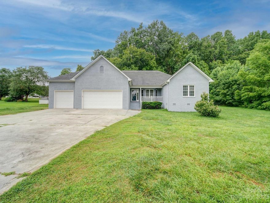 Beautiful FULL brick ranch style home tucked away on road with .88 acres with a 3 car garage. This home Features: New HVAC installed in 2022, Exterior of home painted, NO HOA, Large driveway for additional parking, 3 car garage, SS appliances (Refrigerator & Washer/Dryer Included), Primary Bedroom has 2 walk-in closets, screened in back porch to enjoy the privacy of the backyard, Primary has a Garden tub & Standing shower, Ceiling Speakers w/ receiver included (Living room, Primary Bedroom & Primary Bathroom), HUGE LOT w/ shed in backyard, Attic has TONS of storage space. Home is located approximately 2 miles from the nearest boat landing to enjoy a day of boating or kayaking. (Per the county planning/zoning department an additional dwelling/outbuilding could be built on the parcel, but LOT can NOT be subdivided). UPDATE 2/3/2023: Will provide a $1500 Flooring allowance/ or credit towards updates with an accepted offer.