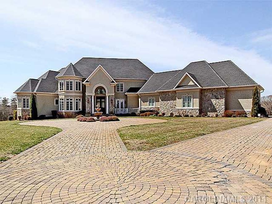 This beautiful 3 level home is situated on 2 parcels totaling 28 Acres. Pond and in an ground pool just a few of the amenities this home offers. Possible Equestrian friendly 28 Acres! Stunning master bath with very spacious closet. Gourmet kitchen. Gym and sauna. Outdoor kitchen with pizza oven, Theater Room, Wine Cellar, Geo Thermal HVAC system. Hidden cigar room. Travertine tile and much more.