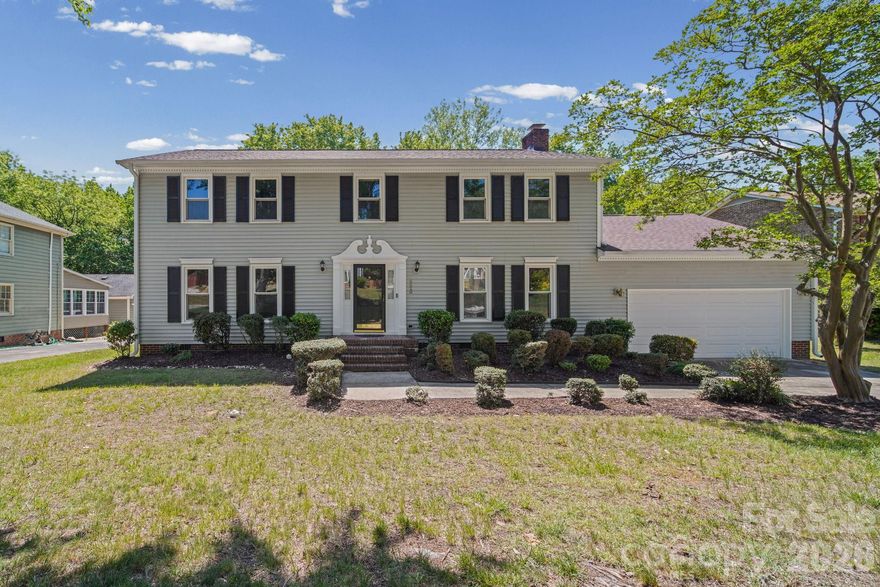 Well maintained, 4-bedroom, 2.5-bath home, on a .35 acre wooded lot is ready for new owner.  Nestled in the quiet neighborhood of Autumnwood, this move-in ready property features a spacious and functional layout with a large living room with fireplace, separate family/entertainment room, and a formal dining room - perfect for both everyday living and entertaining.  The main level showcases gleaming hardwood floors, fresh paint throughout, and newly removed popcorn ceilings (2026), creating a clean, modern feel.  The kitchen offers updated laminate countertops, stainless/black appliances and includes a quality refrigerator, washer and dryer.  Upstairs features a spacious primary suite with a remodeled bathroom and generous sized secondary bedrooms with ample closet space.  Recent updates provide peace of mind, including a new roof (2020), replacement Energy-Star/Low-E glass windows and sliding door (~2 years), newer gutters with guards, updated HVAC systems (2016), and water heater (2016).  Bathrooms have been refreshed with marble vanity tops, freshly painted vanities, new hardware and all new toilets.  Enjoy outdoor living with a large, fenced backyard, mature landscaping, new mulch (2026), and an expanded deck - ideal for relaxing or entertaining.  Additional updates include a new crawlspace door, freshly painted exterior trim and shutters, new lighting fixtures, and a new garage door and opener (2021).  Located in the heart of the University area, this home offers quick access to dining and shopping, UNC-Charlotte, IKEA, the Lynx light rail, major highways, Uptown and entertainment such as Topgolf.  FYI, Autumnwood has no required HOA (voluntary dues of just $30/year to help maintain entrance.)