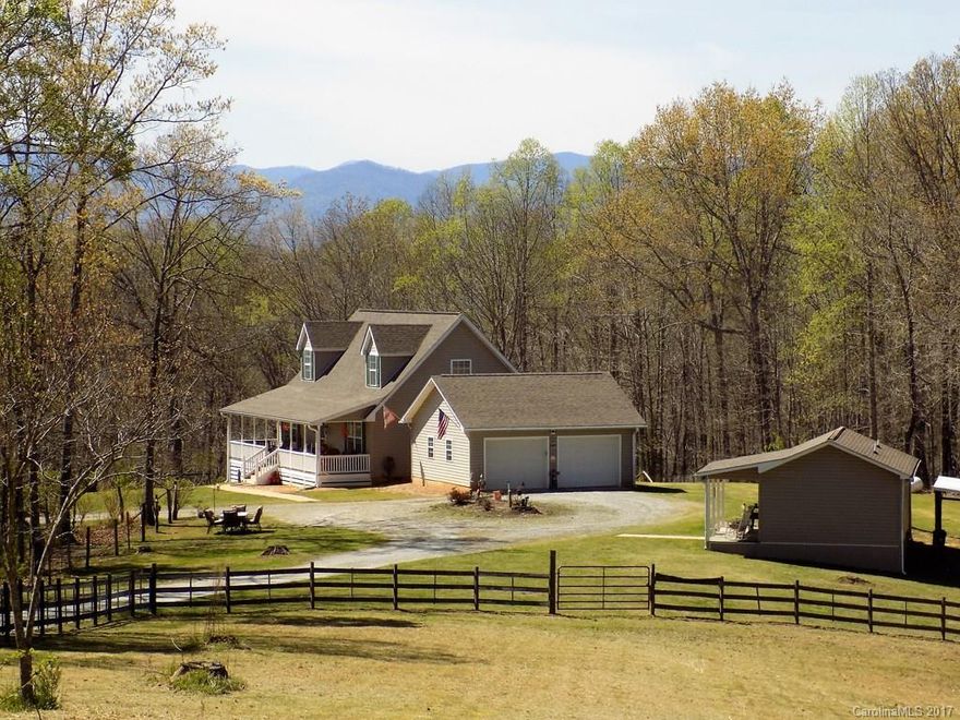 This one has it all!  Three bedrooms, three baths, 8.96 acres fenced, master on main, hardwood floors, double garage, barn, workshop, creek, flat yard, long range mountain views, hiking trails  and attached one bedroom apartment with carport.  Easy access with end of road privacy. Ready for the livestock just open the gate.