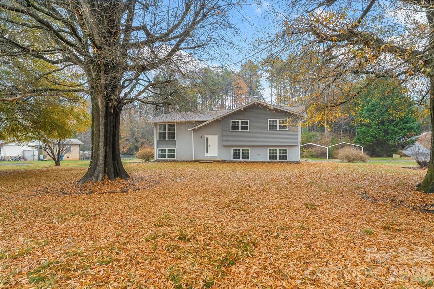 Beautiful and spacious split foyer home! Come tour this great move in ready property today, and discover all the renovations that have been done, including a new roof, new appliances in a newly remodeled kitchen with new cabinetry and quartz counter tops, fully remodeled bathrooms, new windows, floors and more. All bedrooms are on the main level, the additional family room is on the lower level and offers a wood burning fireplace. The parking space is also a great feature in this property with two spaces in the garage and two carports. This home sits on a large level lot and comes with two sheds, and a great location near restaurants, stores and schools, making it perfect for any family.