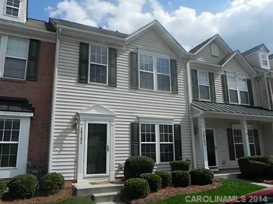 Reduced $4,900.  Seller is ready to sell!  Nice townhouse with new paint,  gas logs, large master and master closet, double vanities in master bath, kitchen with eat at bar, deck off back.  Backs up to trees for a private setting.  Community pool.  Washer and dryer convey. Seller will replace flooring in the kitchen or give flooring allowance.