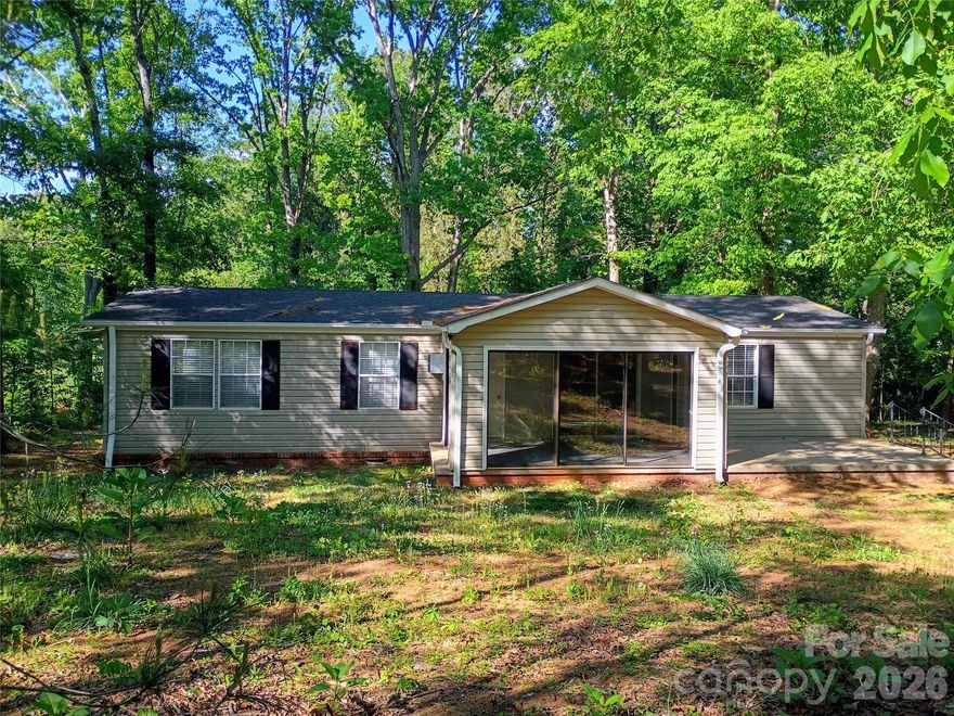 Fresh interior paint, new flooring, interior doors, light fixtures, faucets, range, and a new AC/heat unit in the sunroom—plus a newly constructed back deck for morning coffee—make this home truly move-in ready.

Located just outside the Rutherfordton town limits on a 1.55-acre partially wooded lot, the property offers both privacy and convenience, with easy access to shopping, medical services, parks, and dining.

A must-see to fully appreciate all this home has to offer.

New survey.