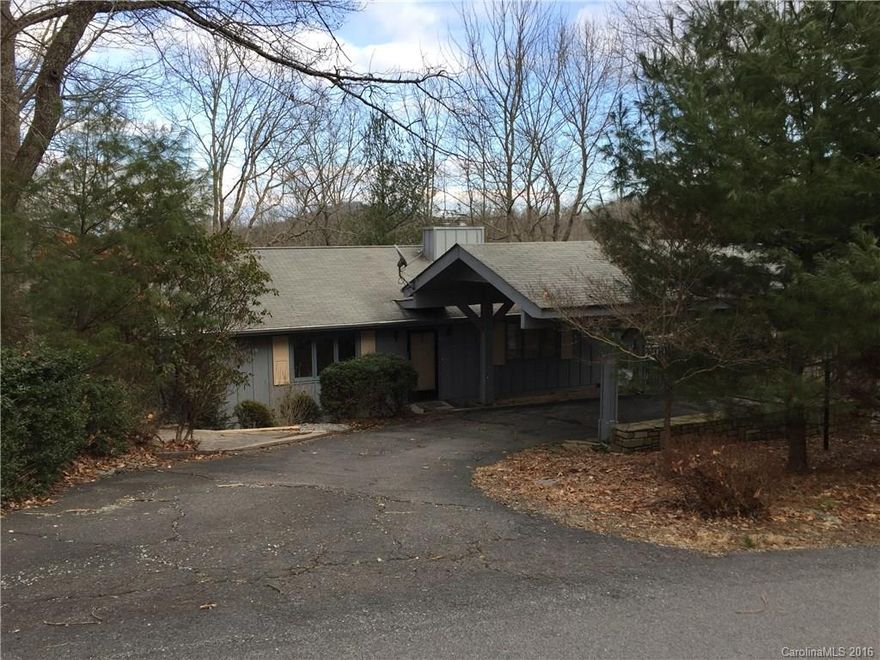 Solid home offered at a great price. Easy access from the East Fork and close to Atagahi Lake. Home features a wood burning stone fireplace, updated bathrooms, a large screened porch and back deck with winter views. Enjoy the numerous amenities of Connestee Falls: golf, pool, tennis, hiking trails, club house, 4 lakes with public access points, privately maintained roads and 24-hour security. Motivated seller.