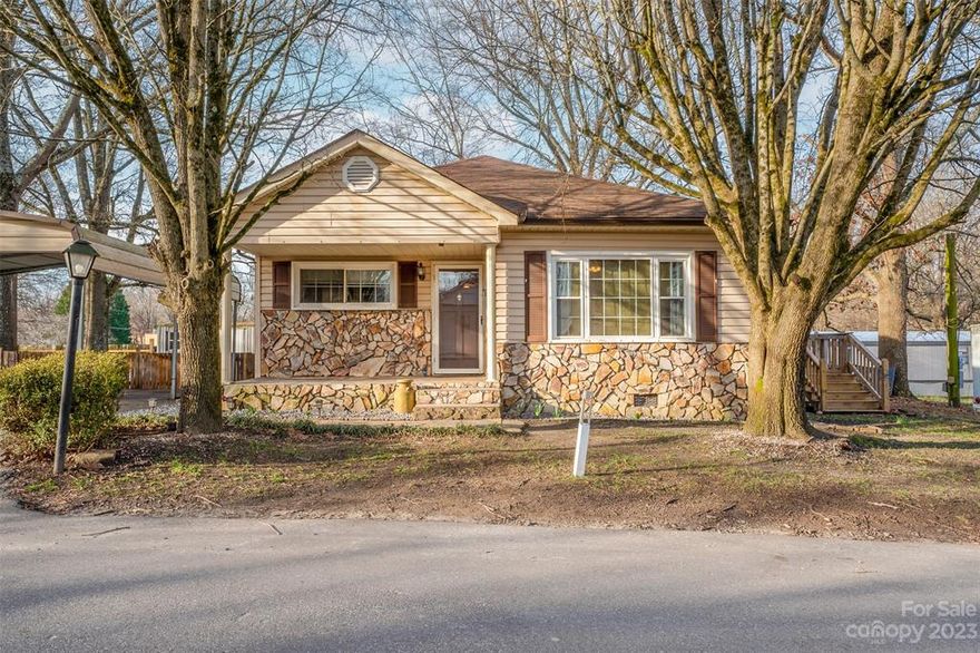 Step into this lovely home with spacious rooms and open floorplan. This move in ready home offers new paint throughout, and newly updated kitchen bathroom. You'll love the living room's cozy atmosphere and the kitchen with lots of cabinets for storage. The large sliding door leads to the deck, which offers lots of space for family get-togethers. Move right in to this Gem of a home!