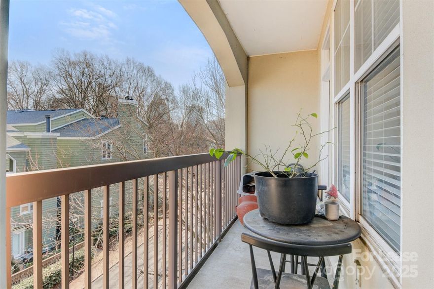 Experience urban living at its finest. Located in the heart of Uptown Charlotte's historic Fourth Ward, you'll find everything you need just steps away. This spacious and well-kept 2 bedroom, 2 bathroom condo offers a desirable open floorplan with plenty of natural light throughout and a secure covered parking garage space. Enjoy all of the modern updates combined with the Fourth Ward's historic charm. Upstairs you’ll find the rooftop terrace with grilling areas and stunning views of the city. Right outside you'll find the Fourth Ward Park, Harris Teeter and much more. With museums, theaters, and many restaurants all within walking distance you’ll never run out of things to do. This home offers luxury, comfort, and convenience you'll never want to leave!