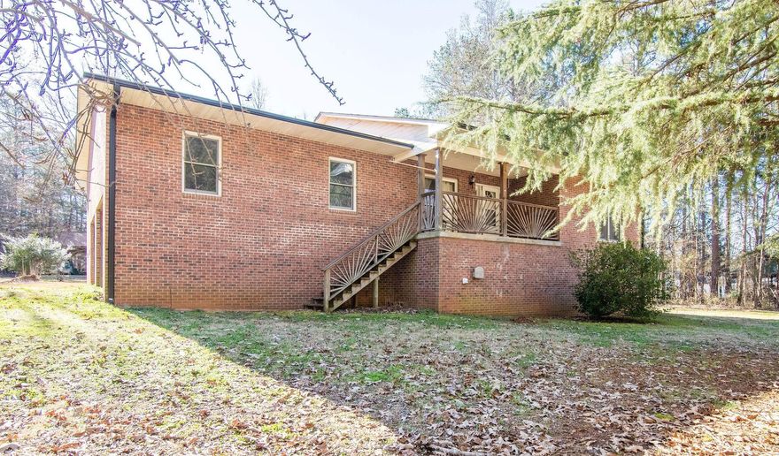 Private Country home with so much potential! This 2bed/2bath home sits on 2.6 private acres, has two very large workshops, open floor plan lots of natural light, a basement, office, laundry room and much more! Do not miss out on this one!