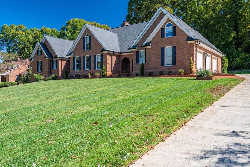 Public Remarks 
AGENT IS OWNER NOW PRICED WELL BELOW RECENT APPRAISED VALUE.  Welcome to this elegant all-brick estate on the edge of Downtown Lincolnton, offering nearly 6,000 square feet of beautifully designed living space. Every detail reflects timeless craftsmanship, from the intricate crown and dental moldings throughout the home to the 20-foot vaulted ceilings that create an atmosphere of grandeur in the living room. The kitchen, featuring granite countertops, new appliances, and an unbelievable amount of cabinet space will certainly be welcomed. On the main level, you’ll find two luxurious primary suites, each with updated bathrooms, along with a sunroom that’s both heated and cooled l, perfect for enjoying year-round comfort or a gentle breeze on warm Carolina days. Upstairs, three additional bedrooms and two full baths provide comfort and privacy for family or guests. Over the garage, a versatile bonus suite, accessible from both the garage and the main house, offers endless possibilities: a guest retreat, home office, or recreation space. The finished basement extends your living area even further, featuring a spacious recreation room with rough-in plumbing for a wet bar, and an adjoining room ideal for a home gym, studio, or workshop. Blending classic architecture with modern updates, this remarkable home offers space, style, and flexibility, all within minutes of Lincolnton’s vibrant downtown.