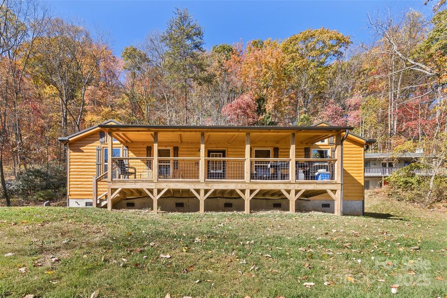 Price Improvement!!!

Modern Mountain Retreat with Views & Short-Term Rental Potential – Candler, NC

Price Improvement! Experience the perfect blend of modern comfort and rustic charm in this beautiful 672 sq. ft. modular tiny home, ideally situated on 1.49 peaceful acres in the scenic mountain community of Candler, North Carolina. Built in 2022, this thoughtfully designed retreat showcases quality construction, stylish finishes, and breathtaking mountain surroundings.

Step inside to an inviting open-concept living area filled with natural light and enhanced by vinyl plank flooring throughout. The modern kitchen features laminate countertops with a granite look, ample cabinet space, and a full suite of appliances—including a refrigerator with ice maker, stove, microwave, and dishwasher—all included.

The spacious bedroom offers a large closet, while the bathroom includes a walk-in shower, plenty of storage, and a washer and dryer. A tankless hot water heater and whole-home water filtration system provide energy efficiency, comfort, and clean water year-round.

Enjoy the cozy look of log-style siding and relax on the large covered front porch while taking in long-range winter mountain views. A 14' x 36' woodworking shop offers excellent space for storage, hobbies, or creative projects. Furniture is optional, allowing you to move right in or customize to your style. The 1.49-acre lot provides plenty of space to garden, explore, or simply enjoy the tranquility of mountain living.

Short-term rentals are permitted, offering flexibility as a primary residence, vacation home, or income-producing investment. The furniture is also negotiable. Please make sure to schedule on showing time - the seller has a pup that will need to be attended to.

Located just minutes from Asheville, this modern mountain retreat is move-in ready and full of potential—offering serenity, style, and opportunity in the beautiful Blue Ridge Mountains.