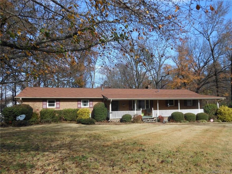 BOM! Full brick ranch on nearly an acre! New 2015: Gas stove, laminate wood floors in great rm, hall bath; Roof 2011; some fresh paint interior. Hard to find wood burning fireplace. True hardwoods & built-ins in spacious living room, Bedrooms nice size w/lg closets, some built in shelving; Master bedroom has private bath w/new walk in shower; Ceiling fans in all bedrooms. original hardwoods LR/BRs. Large fenced yd Storage bldg. Enclosed carport houses pool tbl/dogs & laundry.