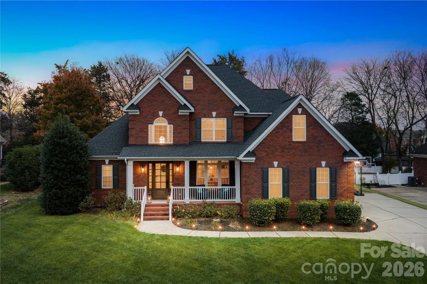 Tucked into Concord’s sought-after Morris Glen neighborhood, this beautifully updated full-brick home offers a blend of warmth, character, and modern comfort. Walk through your Mahogany front door, and a shiplap-accented 2-story foyer sets the tone, warm, considered, and full of character. Hardwood floors and LVP stretch through every room, and natural light pours through the windows, making each space feel both expansive and inviting. A vaulted ceiling adds volume to the main living area, while natural light flows between the living spaces and kitchen, creating an easy setting for everyday living and entertaining. Renovated in 2022, the kitchen is both stylish and functional with quartz countertops, resurfaced cabinets, upgraded hardware, soft-close features, a farmhouse sink, an upgraded faucet, and updated backsplash. 
With five bedrooms, three full bathrooms, including one with dual-entry access, and two bedrooms on the main level, the layout offers ease and flexibility throughout. vaulted ceilings soar overhead, ceiling fans keep every room comfortable, and the details throughout reflect a home that has been genuinely cared for. Outside, your .30 +/- acres stay lush and green with the help of an in-ground irrigation system, and the classic brick exterior requires little maintenance while delivering lasting curb appeal. The big updates are already done, the roof replaced in 2020, and the HVAC in 2021. Morris Glen residents enjoy a community pool, tennis courts, sidewalks, and the clubhouse, with easy access to Concord Mills, Rocky River Golf Club, Charlotte Motor Speedway, and Charlotte. This is the one you have been waiting for.