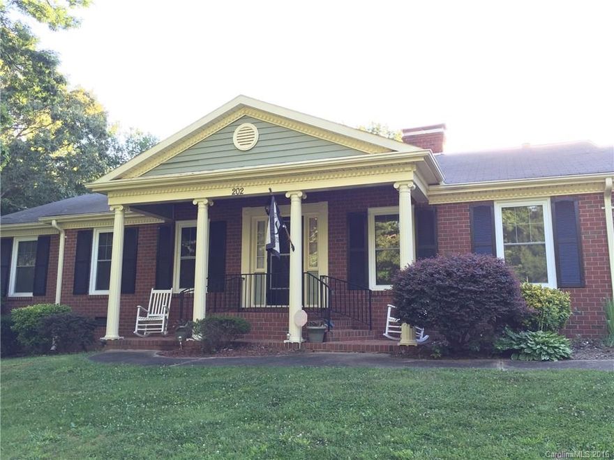 brick ranch. Windows repl 2 yrs ago per seller, gas heat & tankless gas water heat. gas logs& built in gas grill off the sunroom. Above ground pool w nice deck. Updates to plumbing, laminate flooring, HUGE laundry, great closet spaces, built in shelving around brick hearth, formal living & dining plus  eat in ISLAND kitchen & den. Blinds convey. Wired 2 car det garage in &attached 2 car garage.
Good bedroom spaces w carpets only 2 years old. Private back Seller provides home warranty $460.00