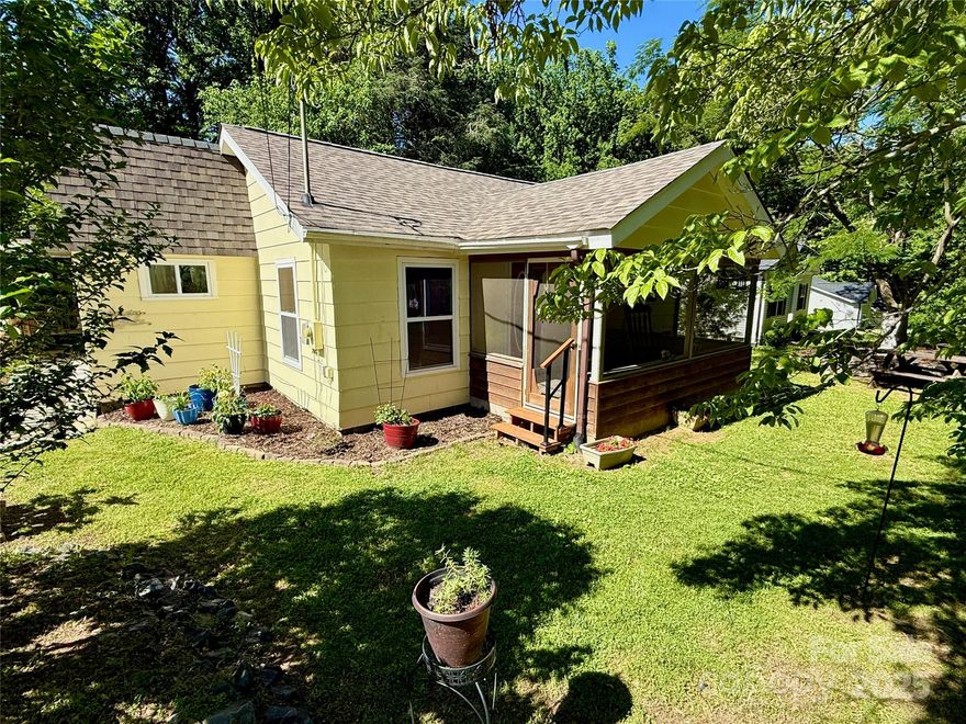 Come see this cozy 2-bedroom, 2-bath ranch home on approximately a third of an acre. This home has been wonderfully maintained and features beautiful landscaping and an oversized 2-car detached garage with a third bay in the back; a perfect setup for the DIY hobbyist. The home also boasts a huge unfinished basement with high ceilings that spans the footprint of the foundation providing added flex space for storage or for just more tinkering. Inside the home you will find updated bathrooms, updated flooring in the main spaces, newer roof (2023), built-ins in the living room anchored by a wood-burning brick fireplace, a large eat-in kitchen with peninsula, breakfast nook, large laundry room, and a screen-in front porch with ceramic flooring.  Large mature trees line the backyard providing privacy and plenty of space to relax, play, or entertain family and guests. Located just minutes from I-85 with easy access to shopping, dining, and entertainment.