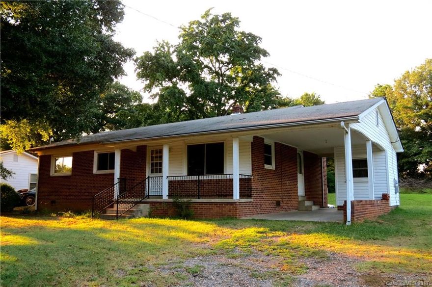 Cozy brick ranch is a nice affordable home or great investment property.  This 3/1 home has fresh paint, a new hot water heater 8/2017, Goodman Heating/Air system installed 12/2011. Seller maintains Terminix bond on the house.  Conveniently located for easy access to major roadways, resturants and shopping.  House being sold As IS Where Is w/ the extra lot beside the house for a total of approx .59 acres.