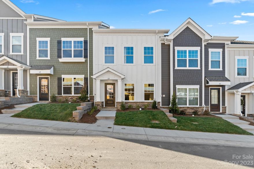 Private, low maintenance living awaits you at The Springs of North Asheville.  This newly constructed 3 bedroom/2.5 bath townhome features white quartz countertops in the kitchen, navy cabinets, Brushed nickel hardware and lighting, stainless steel appliances, and a primary suite on the main level with a tray ceiling. Each bedroom features a walk-in closet as well as access to an upgraded bath featuring white quartz countertops and white cabinets.  Another feature you will enjoy is the private patio for relaxing outside or entertaining with friends.  The Springs of North Asheville is located just minutes to great restaurants and shops in downtown Weaverville and is only 12 minutes from downtown Asheville, this home is convenient to everything.  HOA includes lawn maintenance, maintenance of the home's exterior, maintenance of the homes roof and so much more.