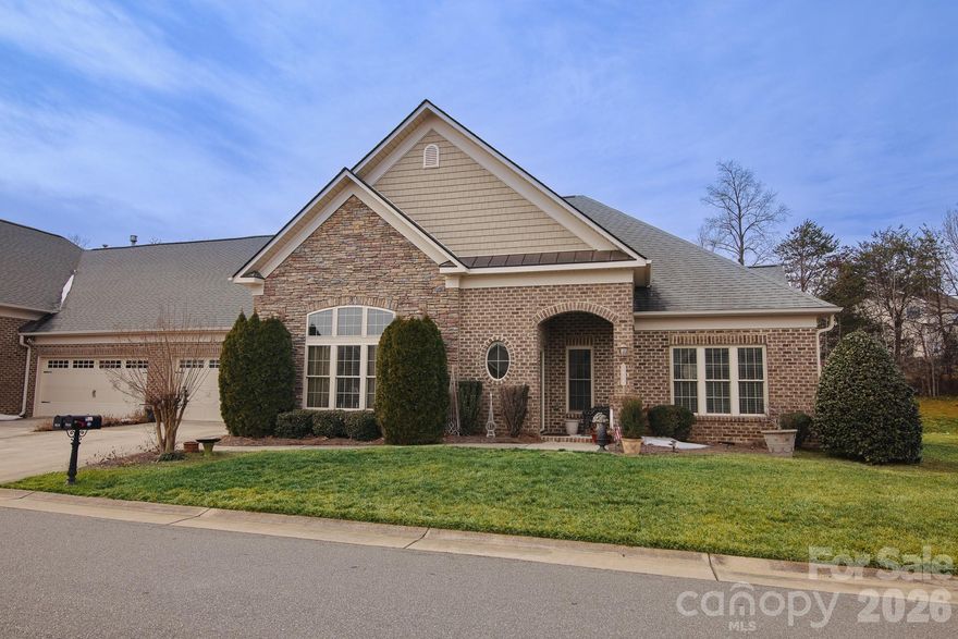 Welcome home to this warm, inviting Greensboro 4BR, 3BA townhome featuring an open-concept main level with hardwood floors, crown molding, recessed lighting, and a cozy fireplace that anchors the living room. The kitchen shines with rich cabinetry, granite countertops, stainless steel appliances, and a generous island — perfect for prep, gathering, and entertaining — flowing seamlessly into the dining area. Upstairs, you’ll find a sizable, comfortable, light-filled bedroom and ample wall space for art or a home office setup. Baths offer timeless finishes, including granite-topped vanities and a tub/shower combo. Enjoy morning coffee or evening downtime on the private screened porch, and take advantage of the spacious two-car garage with extra storage. Classic, well-kept, and move-in ready — this one feels like home. Note: seller will offer credit to replace carpet throughout with acceptable offer!