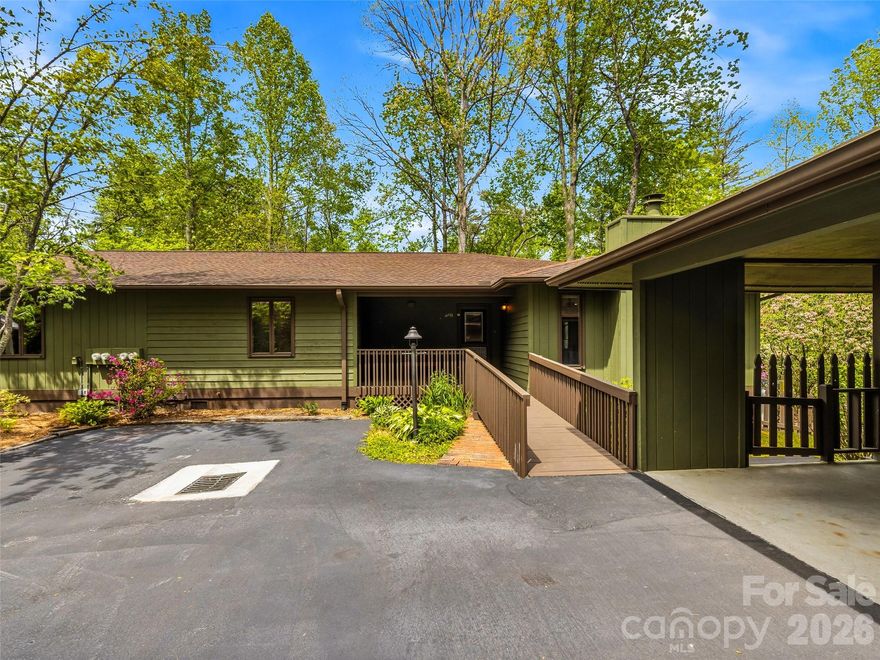 Welcome to effortless one-level living in Sherwood Forest, one of Brevard, North Carolina's most beloved communities. Nestled in the Blue Ridge Mountains just 15 minutes from downtown Brevard and minutes from the trailheads of DuPont State Recreational Forest, this beautifully maintained condo offers the perfect blend of comfort, convenience, and mountain lifestyle. Part of Sheffield Place, an intimate enclave of just three units, this home sits right on the golf course with a short stroll to the community pool and tennis courts. Walk out your front door and connect directly to miles of trails winding past community lakes and lush green spaces. World-class hiking, waterfalls, and cycling are practically at your doorstep. Inside, warm hardwood floors, a cozy fireplace, and a heated sunporch create an inviting retreat you'll want to come home to year-round. The spacious kitchen offers plenty of room to cook and gather, and with two bedrooms, two full baths, and in-unit laundry, every comfort has been considered. Best of all, it's fully furnished and truly move-in ready. A covered carport with storage and extra guest parking rounds out this low-maintenance lifestyle package. Whether you're searching for a full-time residence, a Blue Ridge Mountain retreat, or a lock-and-leave second home near Brevard, NC, 348 Surrey Lane checks every box.  Buyer pays $5000 initial fee if they don't already own a home in the neighborhood.