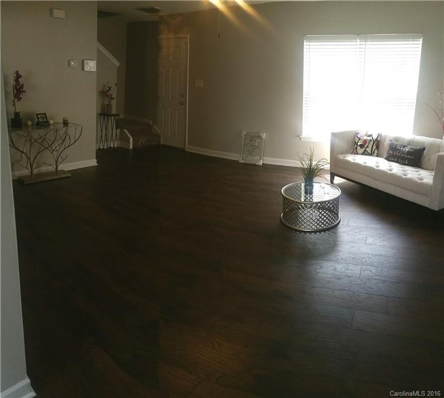 Ready to go remodeled 2 story 3 bed 2.5 bath.Open floorplan.New dark laminate wood floors in living.New carpet in all bedrooms,hallway & stairs.New vinyl in kitchen & bathrooms.Fresh neutral paint throughout.New black appliances & kitchen counters.LARGE master with walk in closet and en suite that features a garden tub.2 in blinds throughout.LARGE backyard for kids to play in spring/summer.Homes are not on top of each other like you see built now a days.Wont be disappointed.