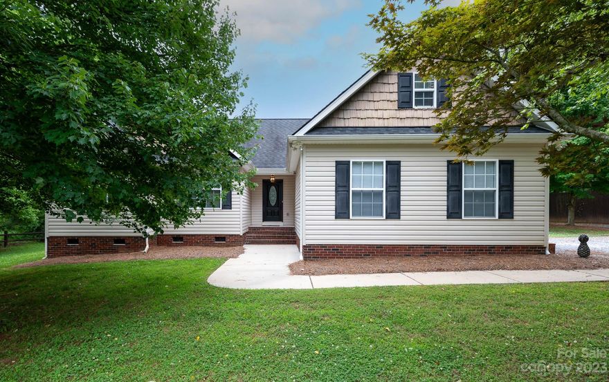 Welcome home to country living just minutes to the interstate, shopping, parks, and dining! This 3 bedroom, 2 bathroom ranch has a great floor plan and is in move-in ready condition! The exterior features a large, flat backyard as well as an attached, side-load, 2-car garage. You'll love relaxing on the HUGE rear deck after a long day! No HOA & No City Taxes!