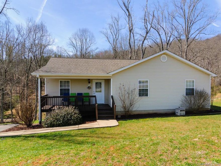 Fantastic home with beautiful sunrises and mountain views, only minutes from Mars Hill and interstate access! Come see this home and fall in love with its tasteful paint colors, open living area and all the possibilities with the bonus areas downstairs.  Outside you will find a deck and large yard, great for relaxing or cooking out with family, friends, or the great neighbors. All this and a quick few minutes to shopping, dining, or back into Weaverville and Asheville. This is definitely a gem!