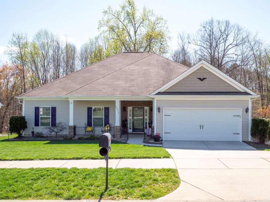 Charming ranch home features 3 bedrooms, 2 baths, hardwood floors, large kitchen with granite and beautiful cabinets, eat at bar, heaving molding, arch openings, family room with fireplace with gas logs, master bedroom features trey ceiling, double vanities in bath with tile shower, walk in closet, nice size secondary bedrooms, security system with live feed cameras. Stunning  back yard with irrigation system. Move in ready!