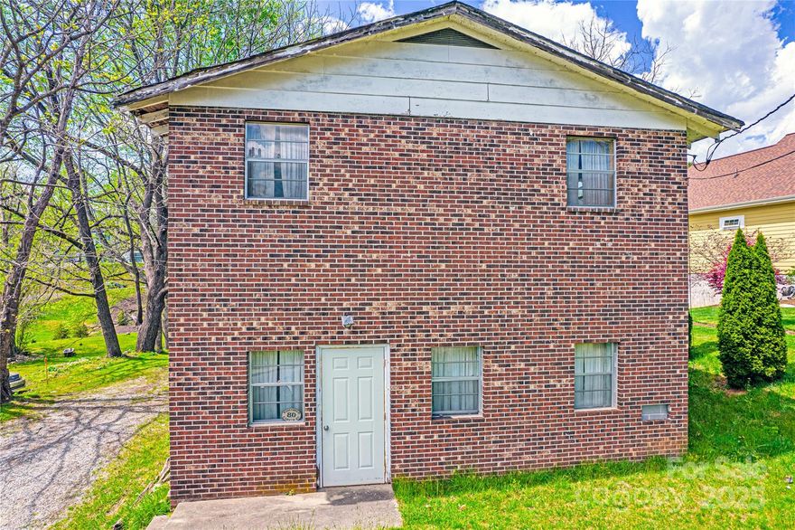 Unique opportunity to get a property with GR8 zoning ( 8 homes per acre) with the ability to put two residences on the property only a couple of blocks off Main Street and with a proposed subdivision plat already completed. In order to subdivide, a city street must be built in the already existing ROW.   The existing building is ready for your renovations and could be converted to a single family home or a duplex.  Great for a builder/developer.