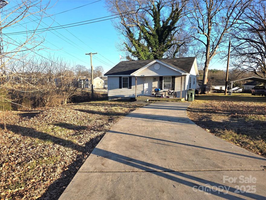 Great rental property or downsizing. covered front porch big back yard. Convenient location minutes from downtown, I -85, retail & hospital.  Month to month lease, Renter has been in home over 2 years. Front of roof replaced 2025.