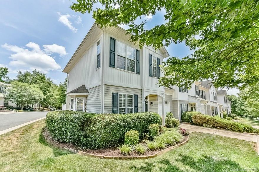 Absolutely Gorgeous 3Br/2Ba End Unit w/Garage on Corner Lot! Former Model Impresses w/Every Upgrade! Gleaming HW's on Main, Designer Paint & Lighting Throughout! Open Floor Plan Boasts Great Room w/Bay Window, Gas Log FP w/Arched Media Niche, Cooks' Kitchen w/Upgraded 42" Cabinets, Generous Work & Storage Space + Pantry.  DR w/Charming Arch to Sunroom! 3 BIG BR's Up, all w/Lighted Ceiling Fans. Rare Walk-in Attic for Incredible Storage! Fabulous Outdoor Living on the Huge, Privacy Fenced Patio!