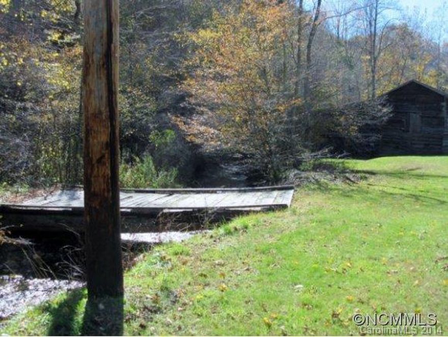 58 ac. level to rolling to steep woodland (w/timber ? value), old trails & a couple of home sites & old school foundation. One boundary is a very bold creek. 1/2 mile to the fly-fishing Laurel River; Nearby access to Pisgah National Forest >> the Appalachian Trail. Wolf Laurel skiing is about 25 mins. away. I-26 is 15 scenic mins.away. Add 10 mins. to Mars Hill/Univ or 25 EZ scenic mins. to Asheville. Proposed tracts "B" & "C" taxes TBD.