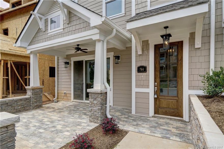 Location! Nestled along the shores of Lake Davidson within walking dist to downtown Davidson, this intimate townhome community is nearly complete. High-end finishes - ELEVATOR, stacked stone FP, heavy moldings, hardwoods, 10' ceilings, 8' doors, custom cabinetry, luxurious master suite w custom closet, coffered ceiling & outdoor porch. 3rd Level brimming w light boasts kitchenette & full bath. Enjoy entertaining on brick paver courtyard & relax on Lake Davidson w your paddleboard, canoe or kayak