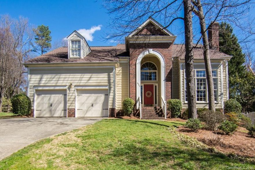 AMAZING home that features an updated kitchen w/ granite countertops, vaulted ceilings, lots of storage, fresh paint, open den, new appliances, built-in desk in the upstairs BR, master suite downstairs, & more! All BRs have walk-in closets. Plenty of natural light & lots of privacy. Spacious fenced-in backyard, w/ stunning landscaping, lots of trees, & a stained deck.  Two car garage w/ floor to ceiling cabinets. Enjoy the neighborhood pool, tennis court, & more. See additional features list.