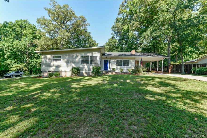 Contemporary ranch in sought after Forest Hills.  Home is ready to move in with granite kitchen, new cook top and subway tile back splash.  New bath room with a stylish barn door.  Lots of effort has gone into making this home perfect for the new owners to call their own.  Outdoor fireplace is perfect for entertaining.  Call now at this price it won't last long.