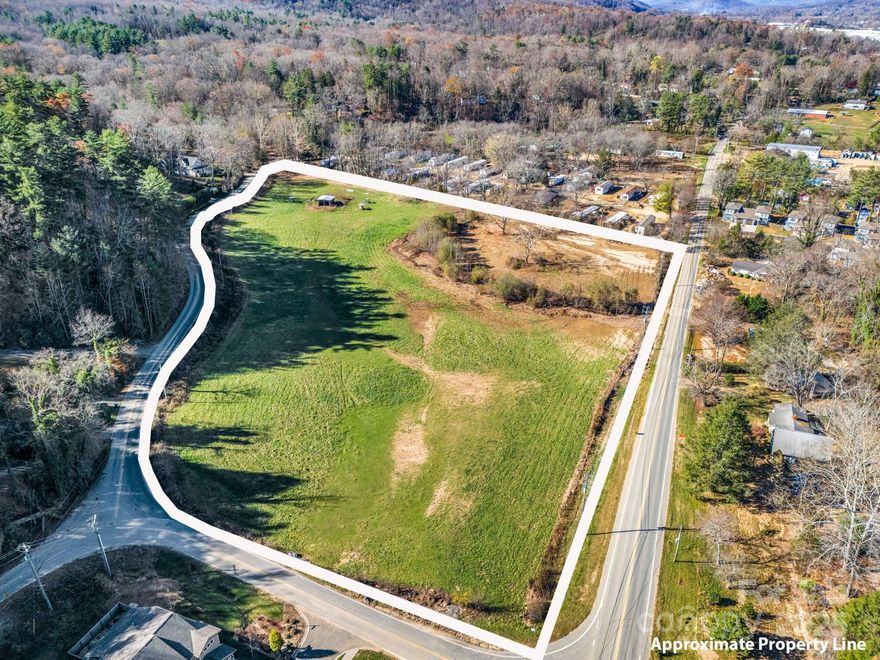 Incredible land opportunity in Black Mountain! Nearly 10 acres of flat land just minutes from Downtown Black Mountain and I-40. Currently used for horse pasture, this land provides a variety of potential uses under Black Mountain Zoning (TR-4). Some uses may require a Special Use Permit or require the owner to meet Additional Requirements. Property is bordered on 3 sides by publicly maintained roads with over 2100' of road frontage. A 60-unit townhome development was recently completed on a similar tract across the street from this property (Sweet Birch Commons). 2 NC Department of Transportation projects are scheduled nearby. More info on those projects is available here: https://townofblackmountain.org/2778/Blue-Ridge-Road-I-40-Interchange. There is a sewer manhole on the property, and nearby properties are on public water. Call list agent for more information.