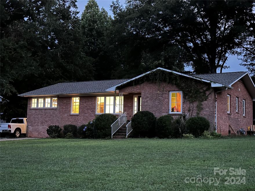 Amazing opportunity to own (or build) your dream home on .5+ acres near the heart of Davidson! This beautiful brick ranch home is nearly finished with a major renovation! Brand new roof, HVAC, floors, bathrooms, windows, interior and exterior doors, fully encapsulated crawl space and more! You'll fall in love with this home from the moment you walk in!  Highly desirable open concept family room, dining room and kitchen. The split bedroom layout features a brand new primary suite and a separate hallway with a full bathroom located between the 3 additional bedrooms. Kitchen renovations have been put on hold to allow for the new buyers to finish the kitchen to their taste. This quiet neighborhood is a true gem with large lots, no HOA and no through traffic. Don't miss this rare opportunity to live within walking distance to all Davidson has to offer! Sellers will entertain offers now to decide whether to accept or finish renovations and list at higher price to reflect the final work done.