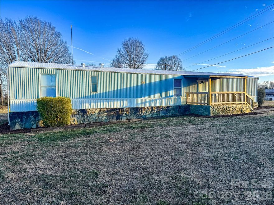 Perfect start to your rental portfolio! Check out this 3BR 2BA Mobile home situated on an oversized 1 Acre lot in Vale NC. Central Air, Well & septic in place. Front and rear covered deck. Inside features split BR plan with primary bedroom & two full baths. Living room opens in to kitchen/dining area. New linoleum floors, fresh paint. Covered Pole Shed. Paved access with fresh gravel drive. Won't last!