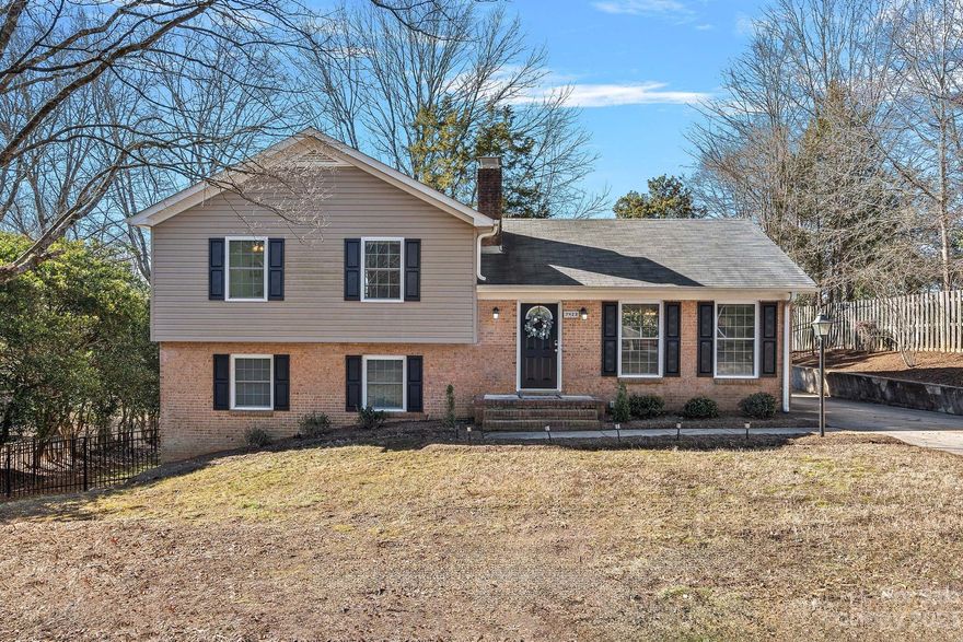 Welcome Home! Discover the perfect blend of comfort and style in this charming 4-bedroom, 2-bath split-level home in the sought-after Heritage Woods neighborhood. As you enter, a sense of warmth welcomes you to the main level, where the heart of the home awaits. The lower level features the primary bedroom, offering a tranquil retreat with a full bath and a spacious walk-in closet. On the upper level, three additional bedrooms await, complemented by an updated bathroom with a touch of modern elegance. Fresh paint throughout the home creates a bright and inviting atmosphere. Step outside to the fenced yard, complete with a shed for extra storage, creating a private oasis for relaxation and play. This home is more than just living space; it's a haven of comfort and functionality, offering a serene setting close to amenities and parks.