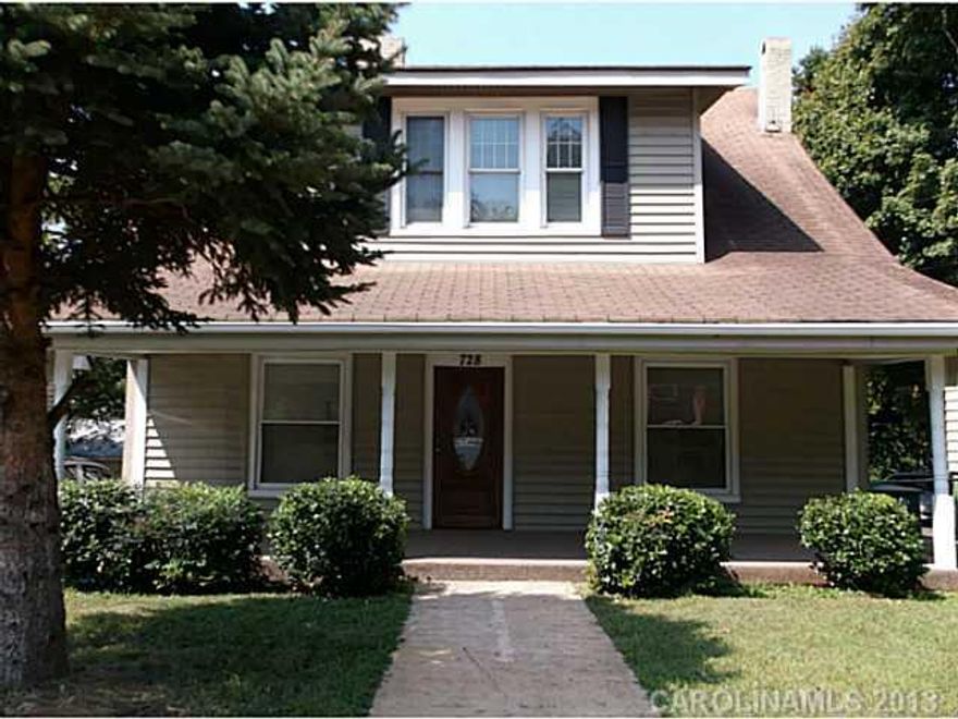 Totally updated and move in ready!  Beautiful hardwood floors throughout except ceramic tile floors in baths.  New updated kitchen with stainless steel appliances, covered front porch and fenced back yard.