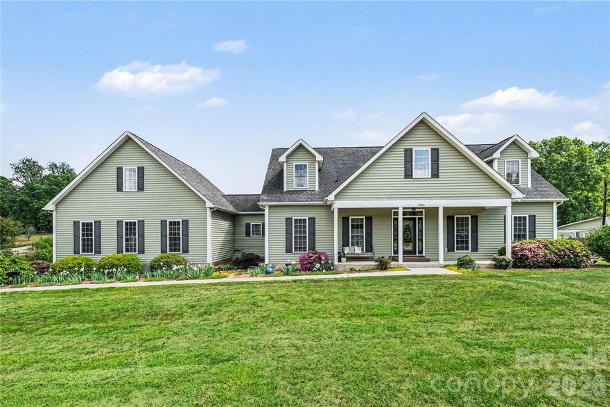 Welcome home to 3985 Mt. Hope Church Road! Escape to your own sanctuary, a meticulously maintained home nestled on over 5 acres, offering the perfect balance of tranquility and convenience. Located away from the hustle and bustle yet just minutes from Interstate 85 for an easy commute, this property boasts low county taxes and no HOA, making it an ideal choice for those seeking peace without sacrificing accessibility.

As you approach, you'll be greeted by both front and back covered porches, perfect for enjoying serene views of  over 2 1/2 wooded acres that borders two stocked ponds with a dock, has walking trails, and is perfect for ATVs.

The heart of the home is the inviting living room, adorned with a wood-burning fireplace, gleaming hardwood floors, and an open floor plan that’s perfect for entertaining family and friends. You'll love the spacious kitchen with granite counter tops, timeless tile backsplash, center island, plentiful cabinet space with lighting underneath, and arched openings, as well as updated light fixtures and a commercial style sink faucet. The main level primary bedroom creates a cozy retreat, featuring a second wood-burning fireplace, two generous walk-in closets, and a beautifully updated en suite bathroom complete with a luxurious garden tub. 

Upstairs, you'll find two additional bedrooms along with a versatile bonus room that can serve as a home office, gym, or entertainment area, catering to your lifestyle needs. 

Completing this impressive package is an oversized two-car garage and a practical storage shed, offering ample space for your vehicles and equipment.

This home is not just a dwelling; it’s a lifestyle upgrade. Call today for the opportunity to make it yours!